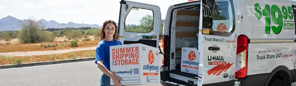 Girl packing up a cargo van to move to college