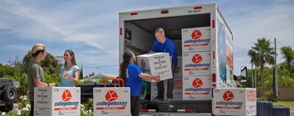 College movers helping students unload a moving truck