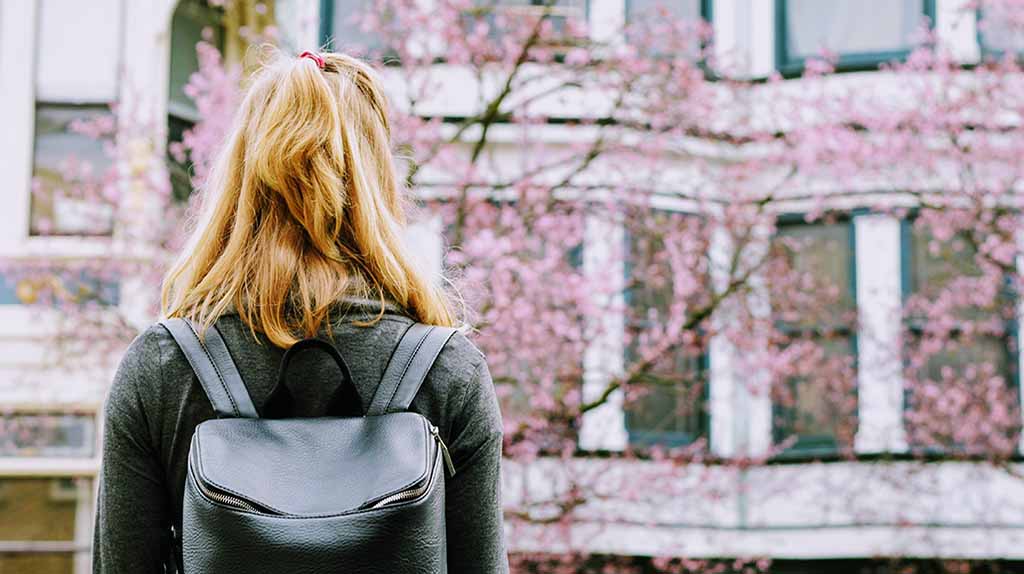 young adult woman viewing new home