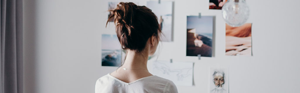 woman viewing wall art