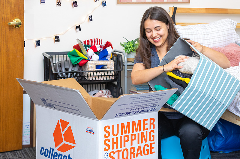 Boarding School student packing for College