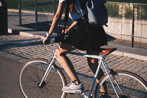 College Student riding bike