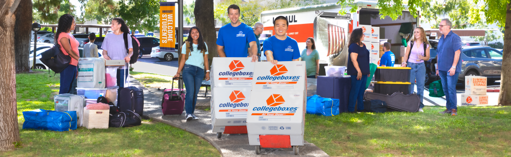 Collegeboxes movers pushing towers of boxes through a busy campus.