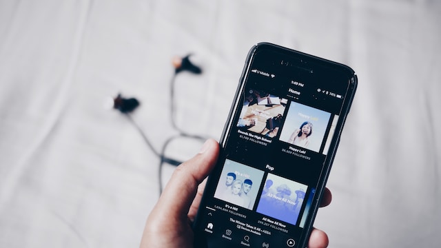 IPhone displaying a Spotify homescreen