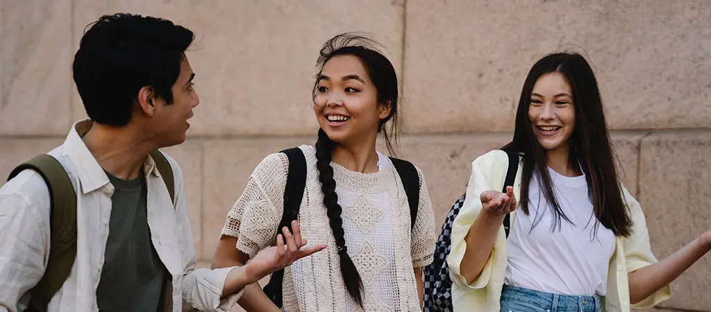 Students talking and laughing during campus tour