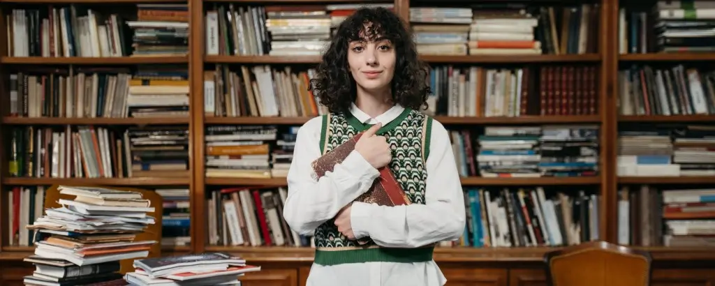 Young college student in the library.