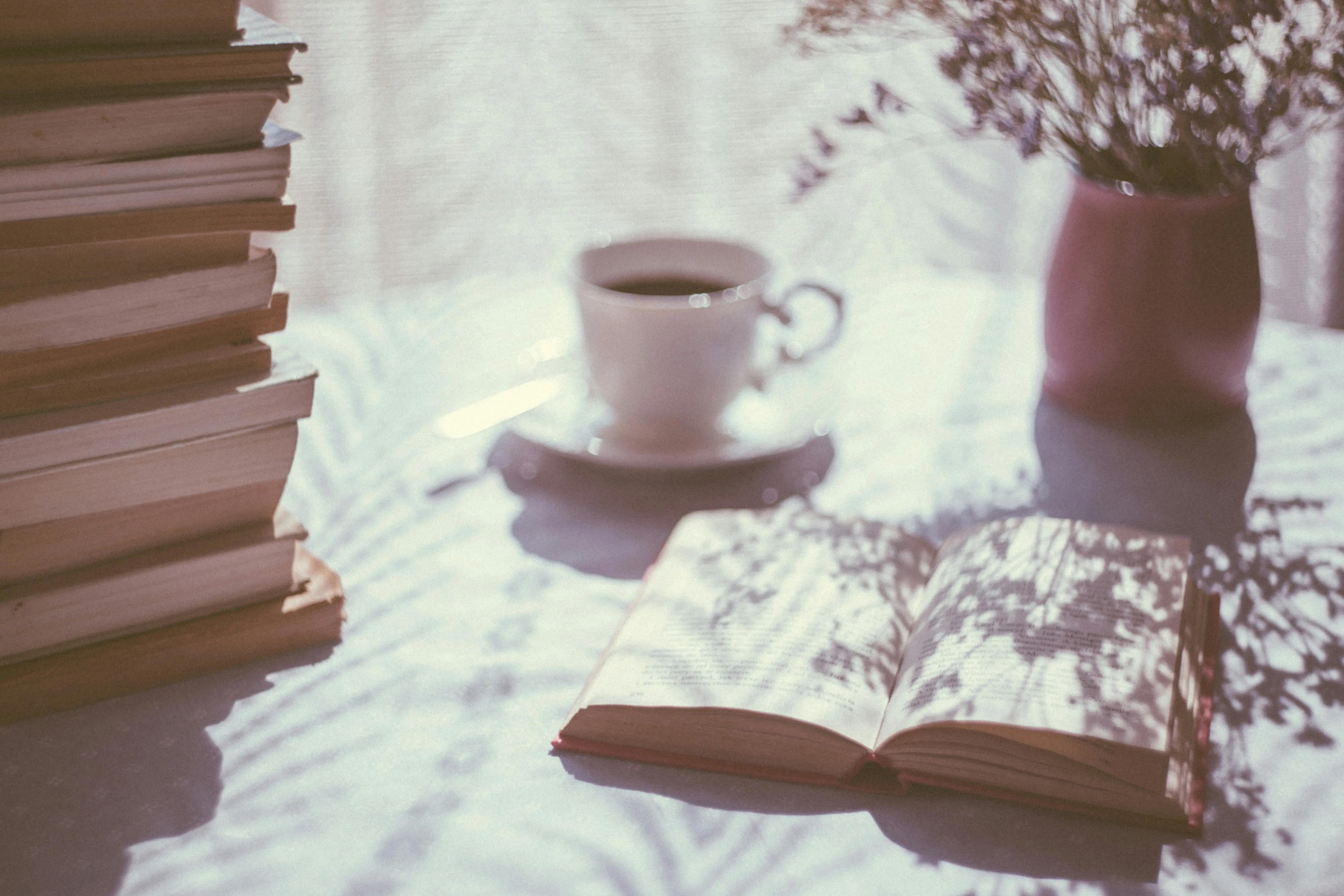 books and coffee on a table.