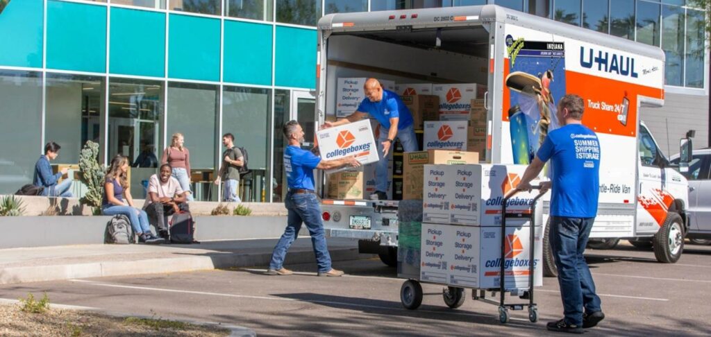 Collegeboxes employees moving out of a U-Haul truck